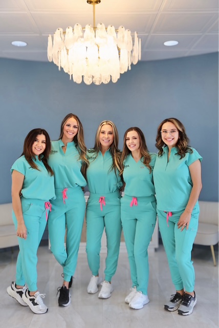 Lifestyle 247 team in teal scrubs